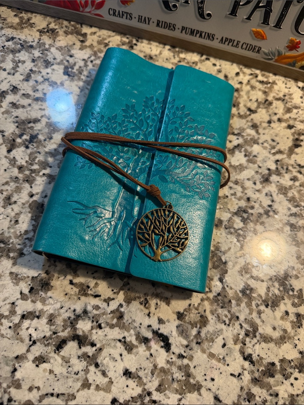 Handcrafted Teal Tree-Embossed Leather Journal with Charm